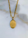 Gold Dipped Oval Our Lady Of Guadalupe Necklace