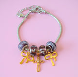 Cross & Bow Charm Bracelet