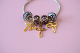 Cross & Bow Charm Bracelet